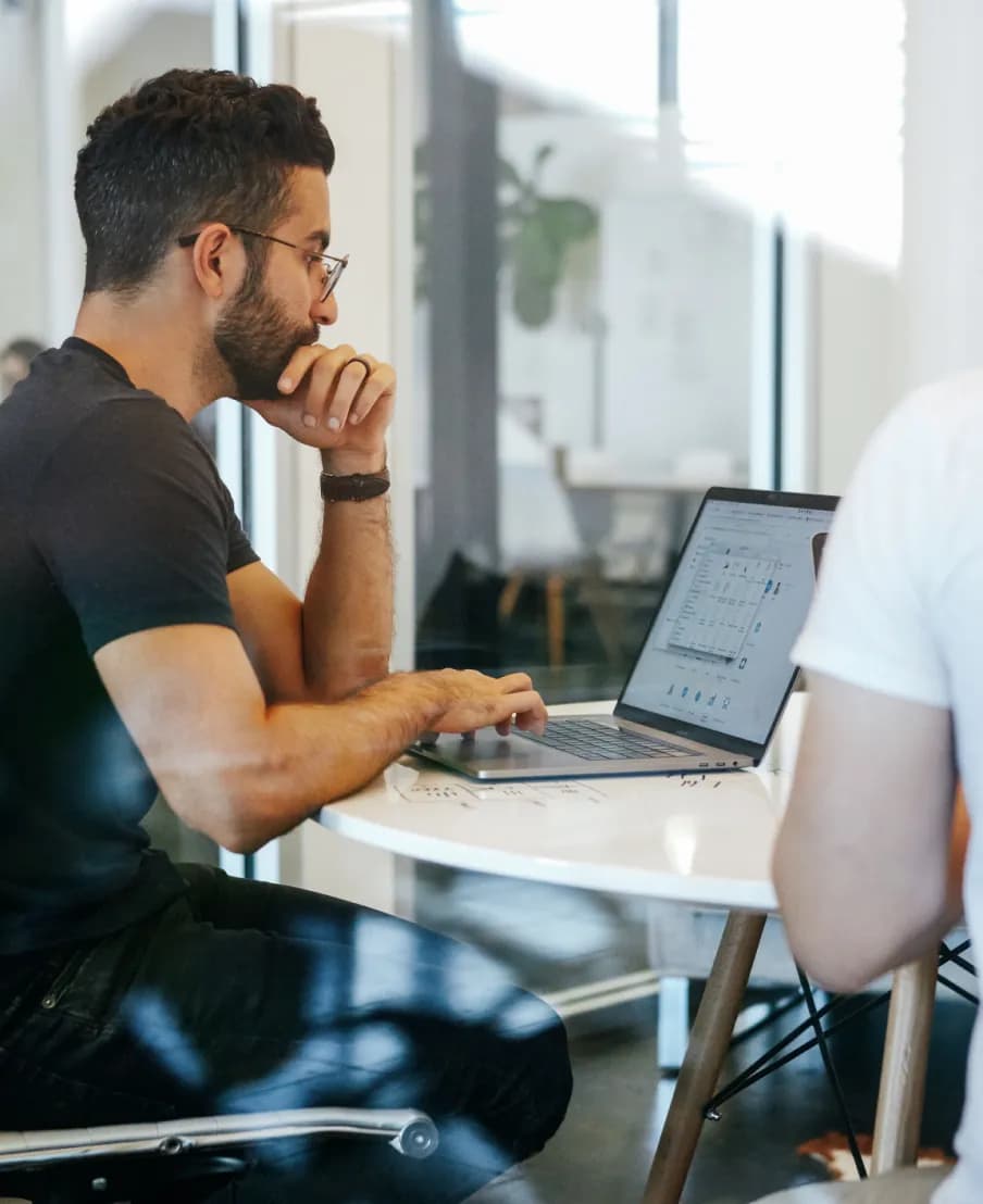 Person on couch with laptop